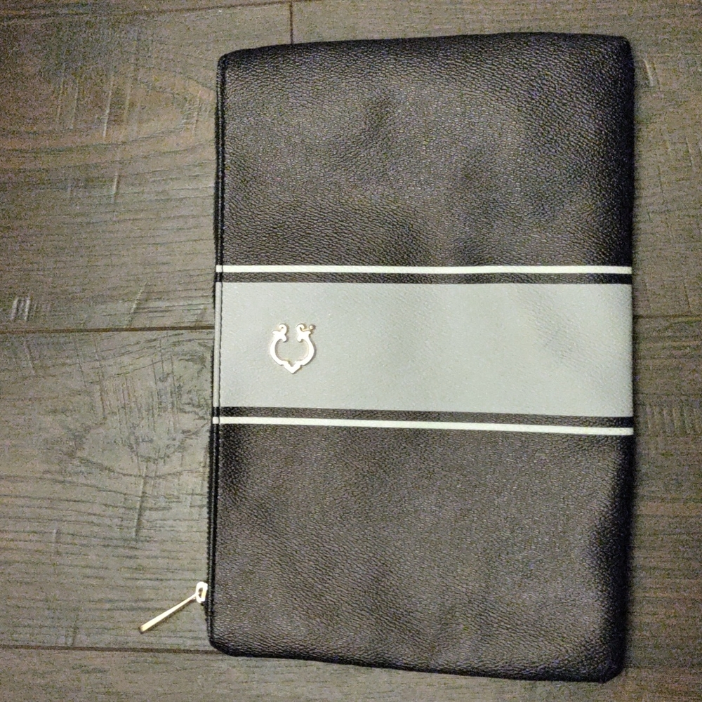 C. Wonder Clutch Bag